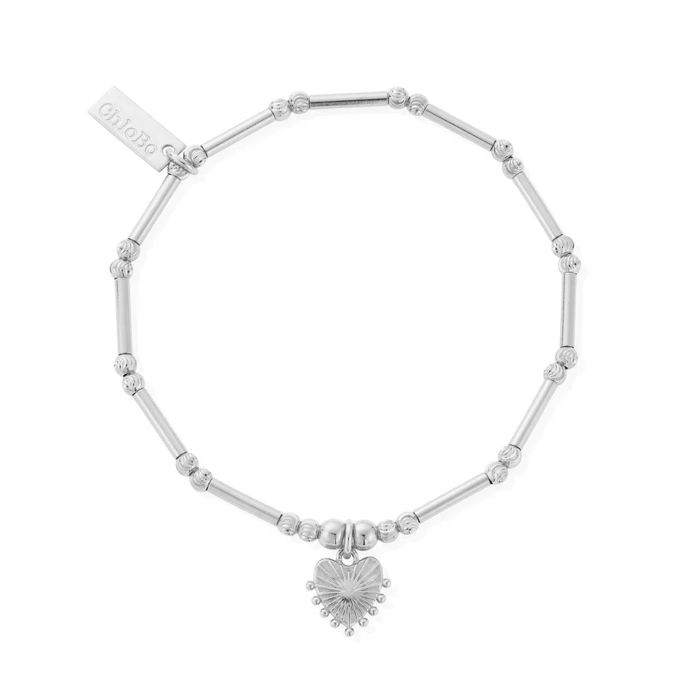 Silver beaded bracelet with heart charm.