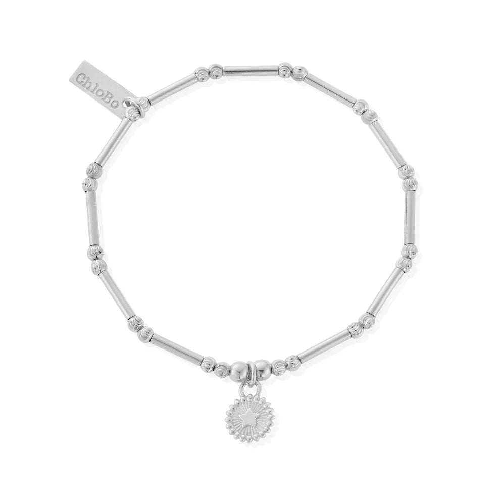 Silver ChloBo bracelet with star pendant.