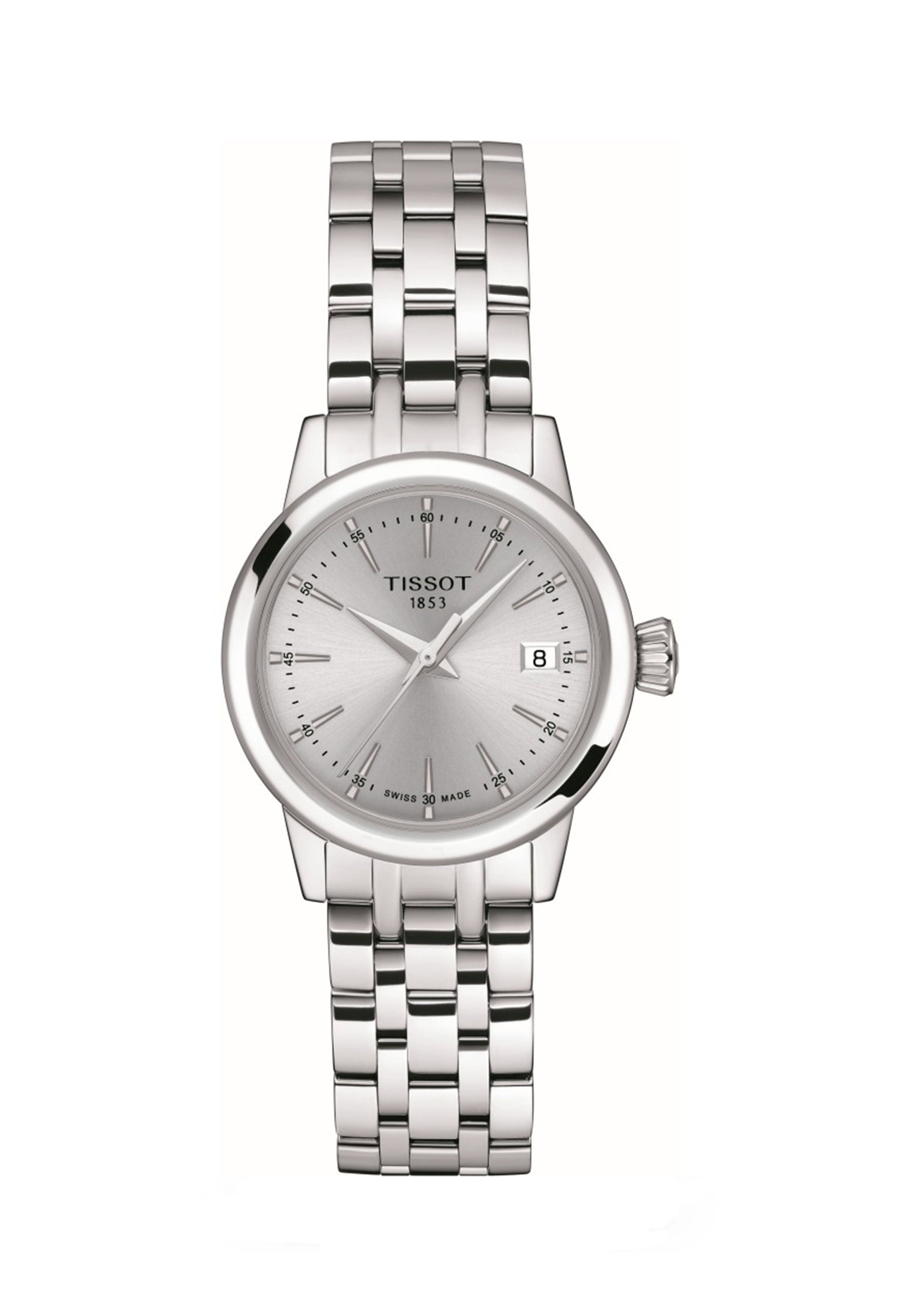 Close-up of the Tissot Classic Dream stainless steel watch featuring a clear view of the watch face & date display.