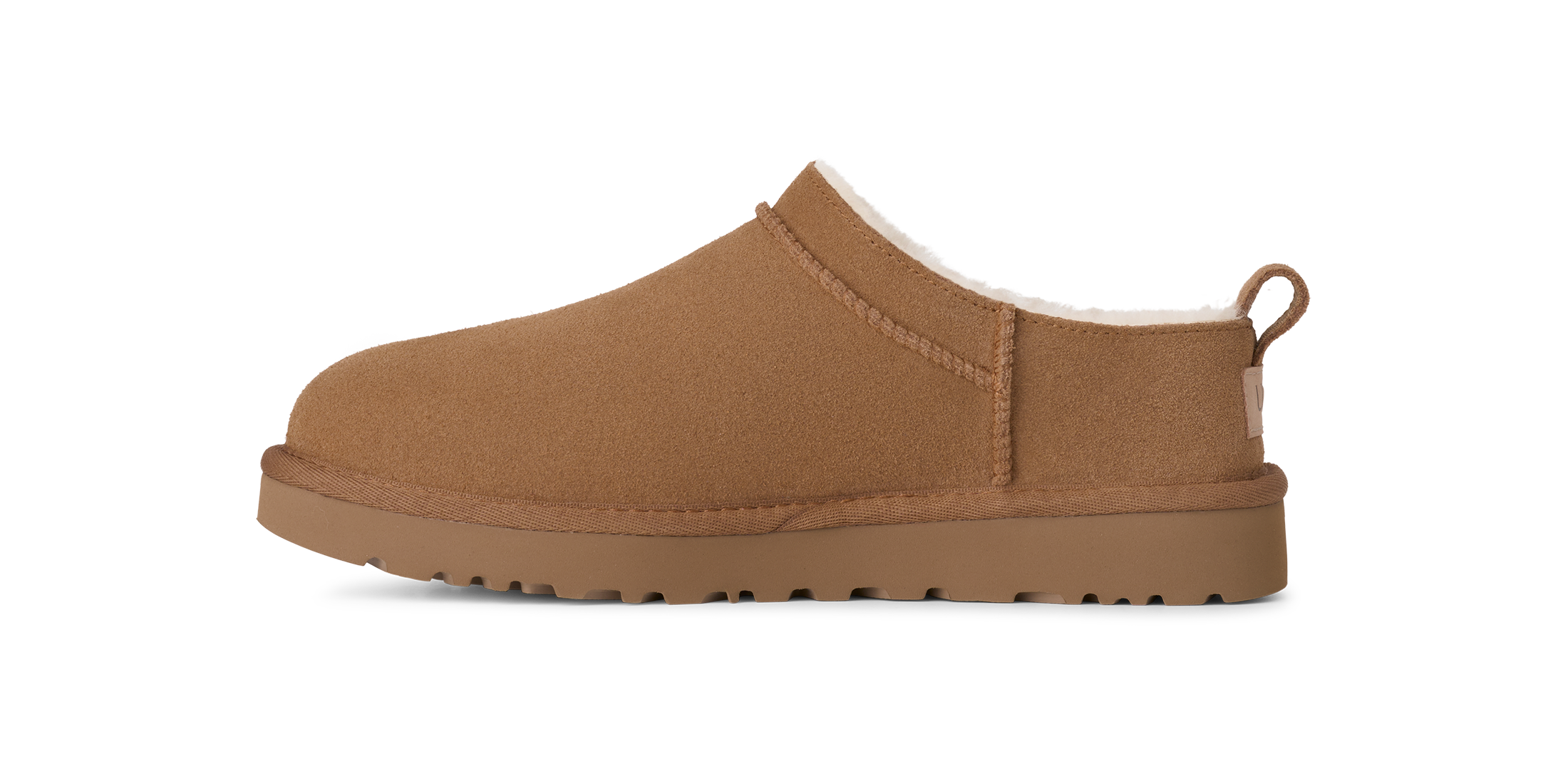 Brown UGG slip-on shoe on a white background