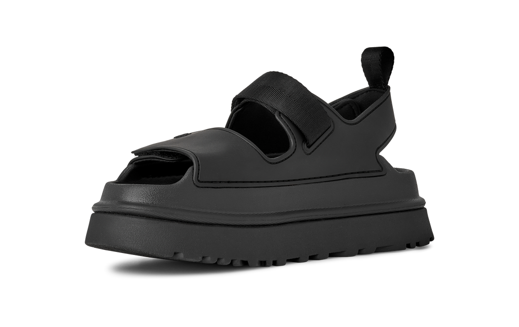 Black rubber sandal with thick sole on a white background