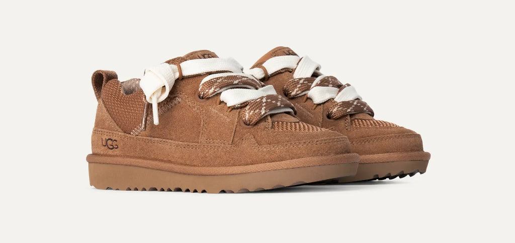 Brown UGG suede sneakers with white laces on a white background