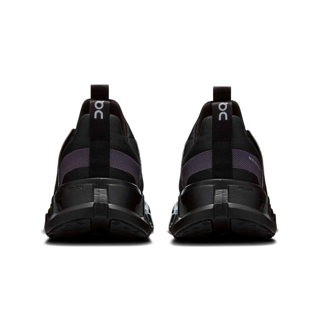 pair of black kids on running trainers