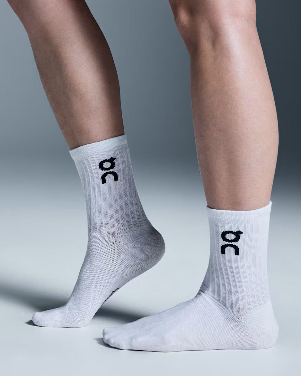 Unisex On Running White Logo High 3-Pack Socks WITH ON LOGO worn on model