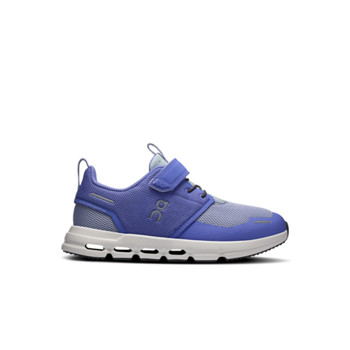 Blue athletic shoe with white sole on a white background