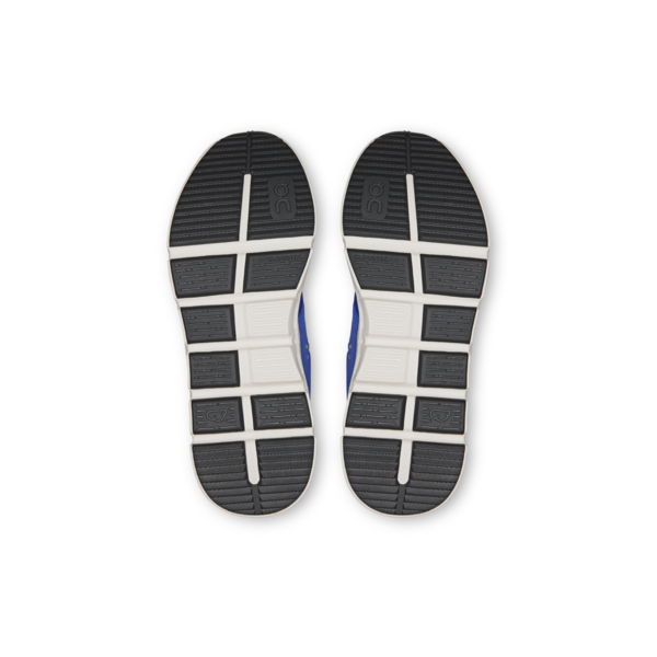 Top view of a pair of black and white shoes on a white background