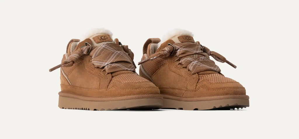Pair of UGG brown sneakers on a white background