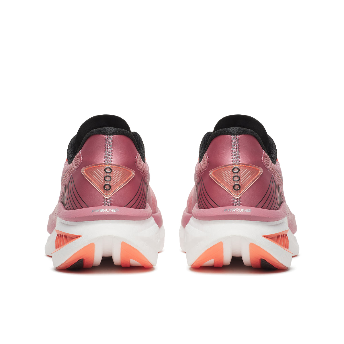 Pink running shoes with white sole on a white background