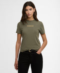 Woman wearing a green t-shirt with a brand logo on a white background