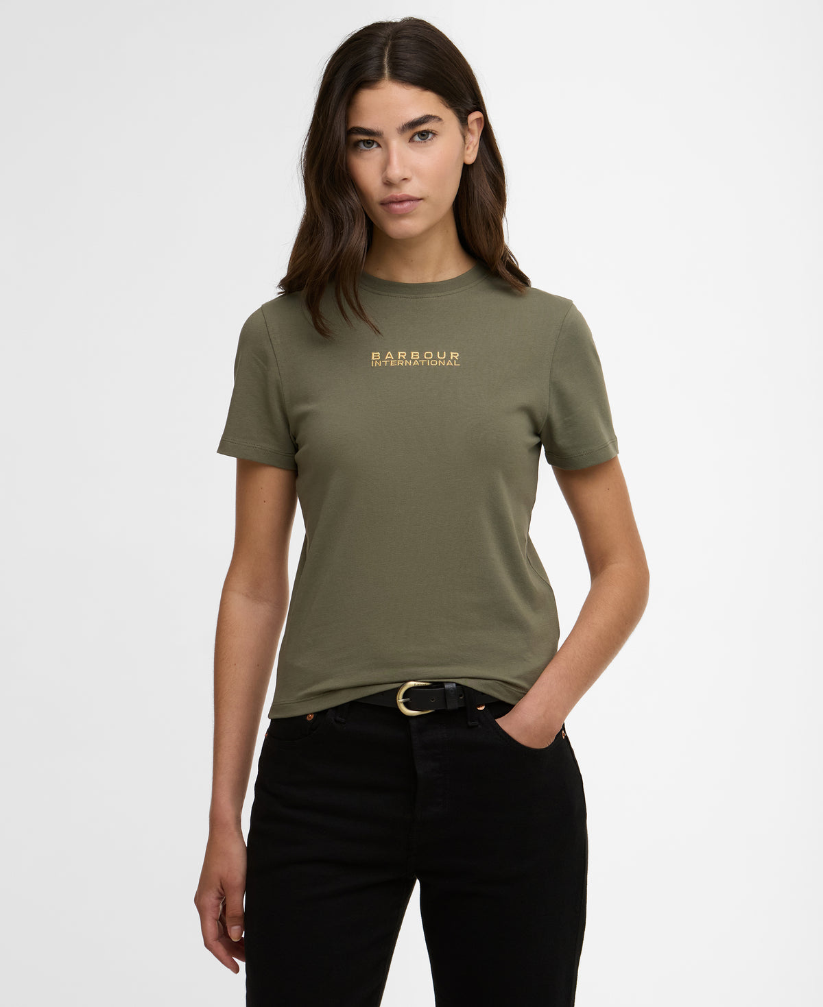 Woman wearing a green t-shirt with a brand logo on a white background