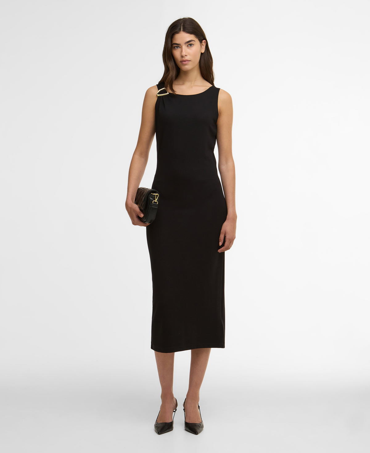 Woman wearing a black sleeveless dress on a white background