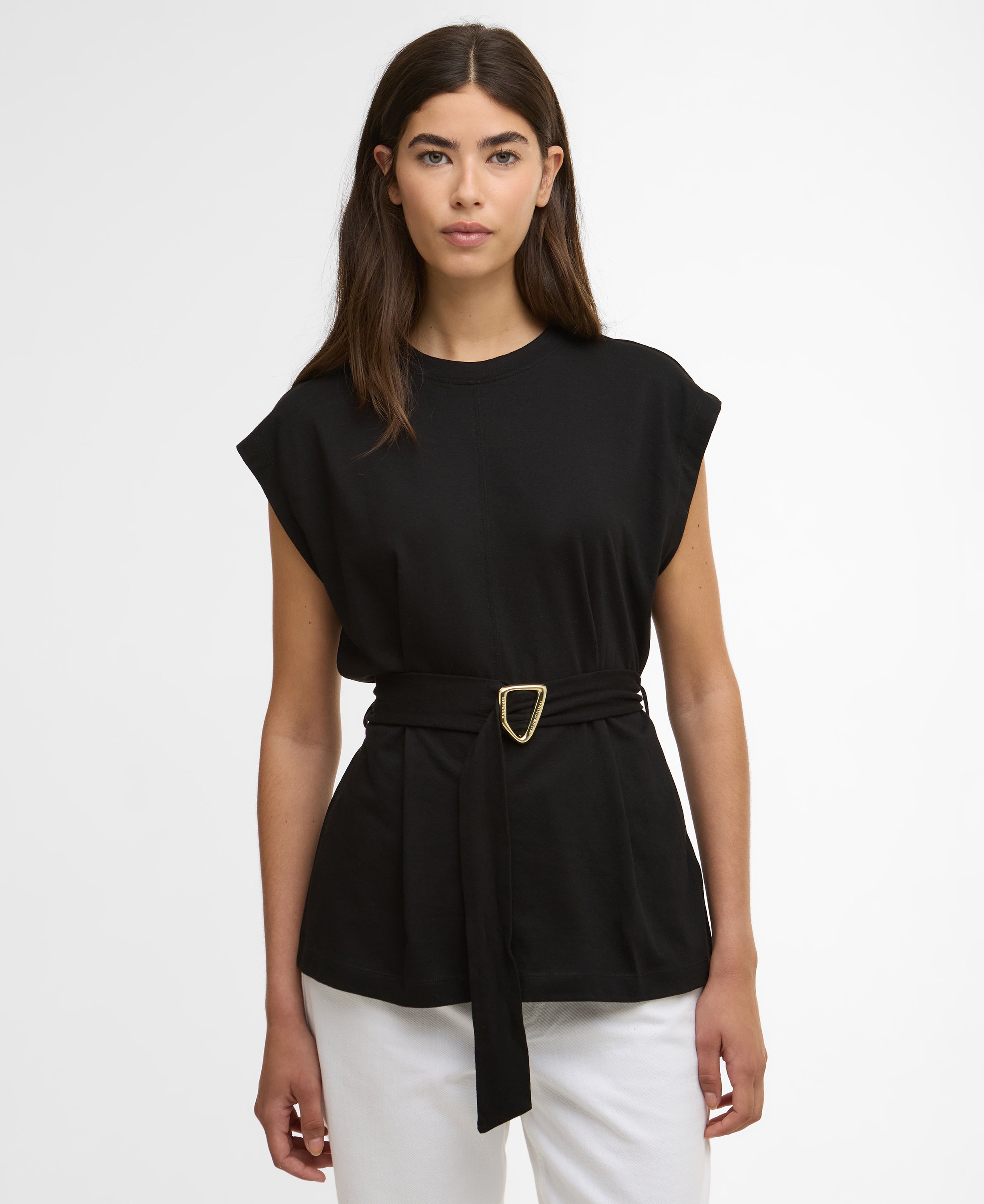 Woman wearing a black top with a belt on a white background