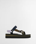 Black and green sandal with a white background
