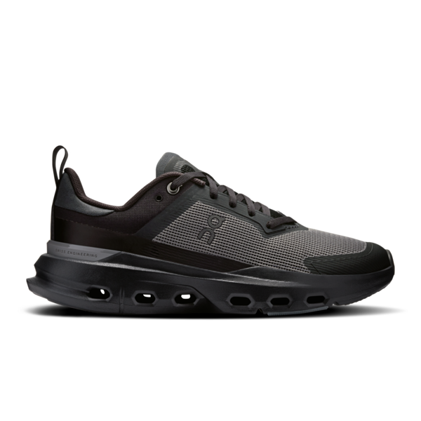 Black and gray athletic gym shoe on a white background
