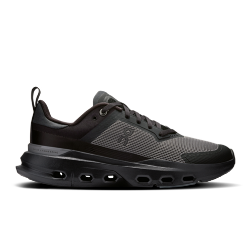 Black and gray athletic gym shoe on a white background