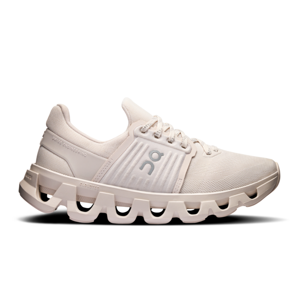 White running shoe with unique sole design on a white background