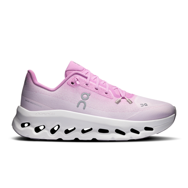Pink running shoe with white sole on a white background