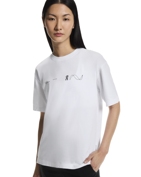 Person wearing a white t-shirt with a logo on a white background