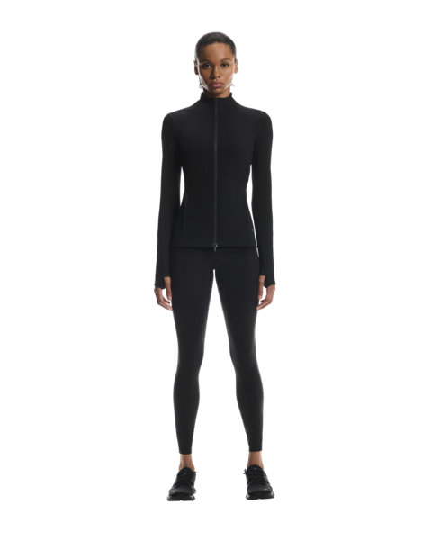 Person wearing a black athletic outfit on a white background