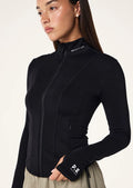 Person wearing a Women's P.E Nation Black activewear Jacket with a white background