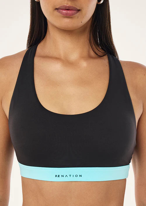 Black sports bra with a light blue band featuring 'Renation' branding on a plain background.