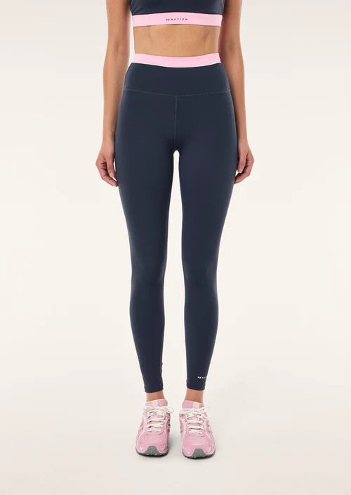 navy blue sports leggings with a pale pink waistband detail