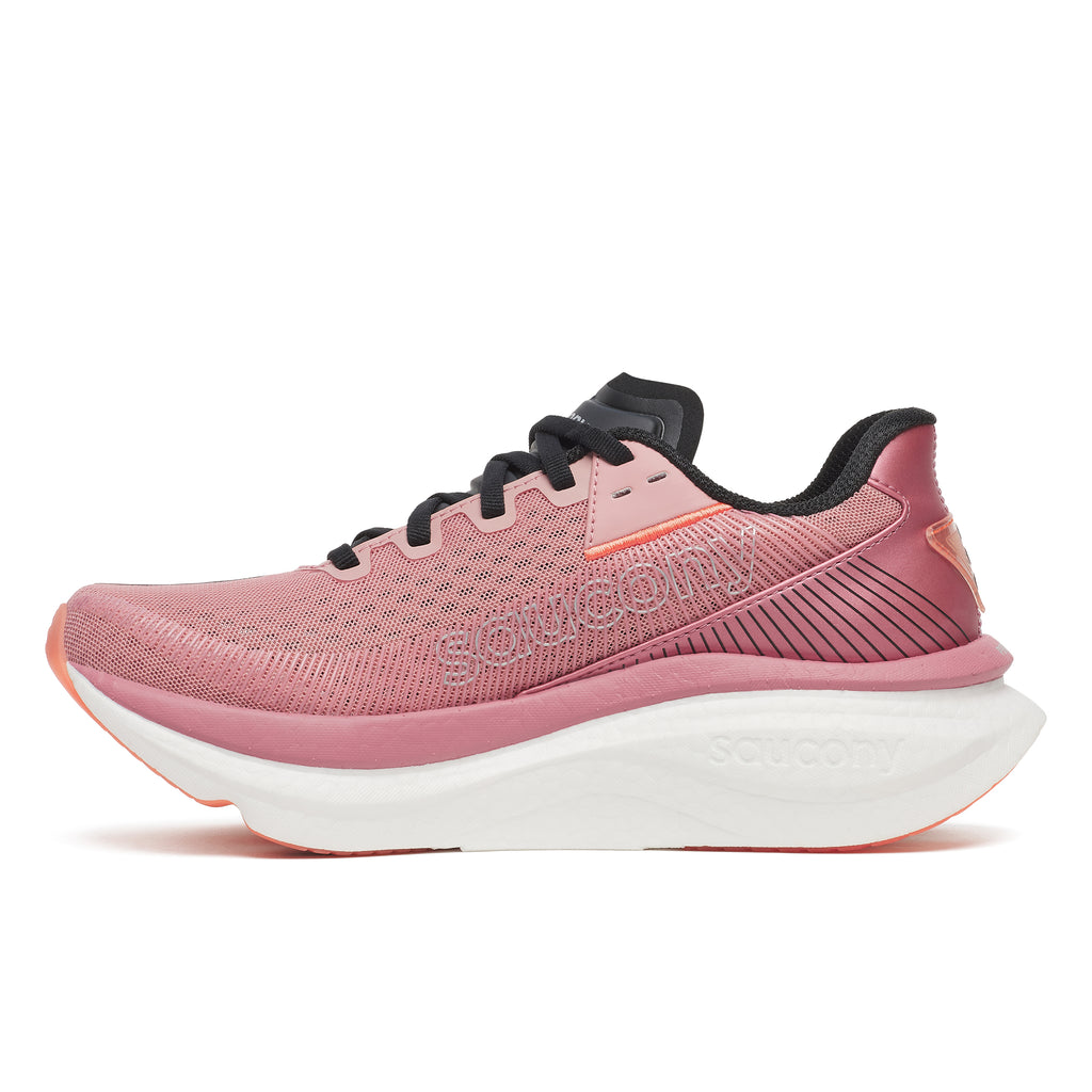 Pink running shoe with white sole on a white background