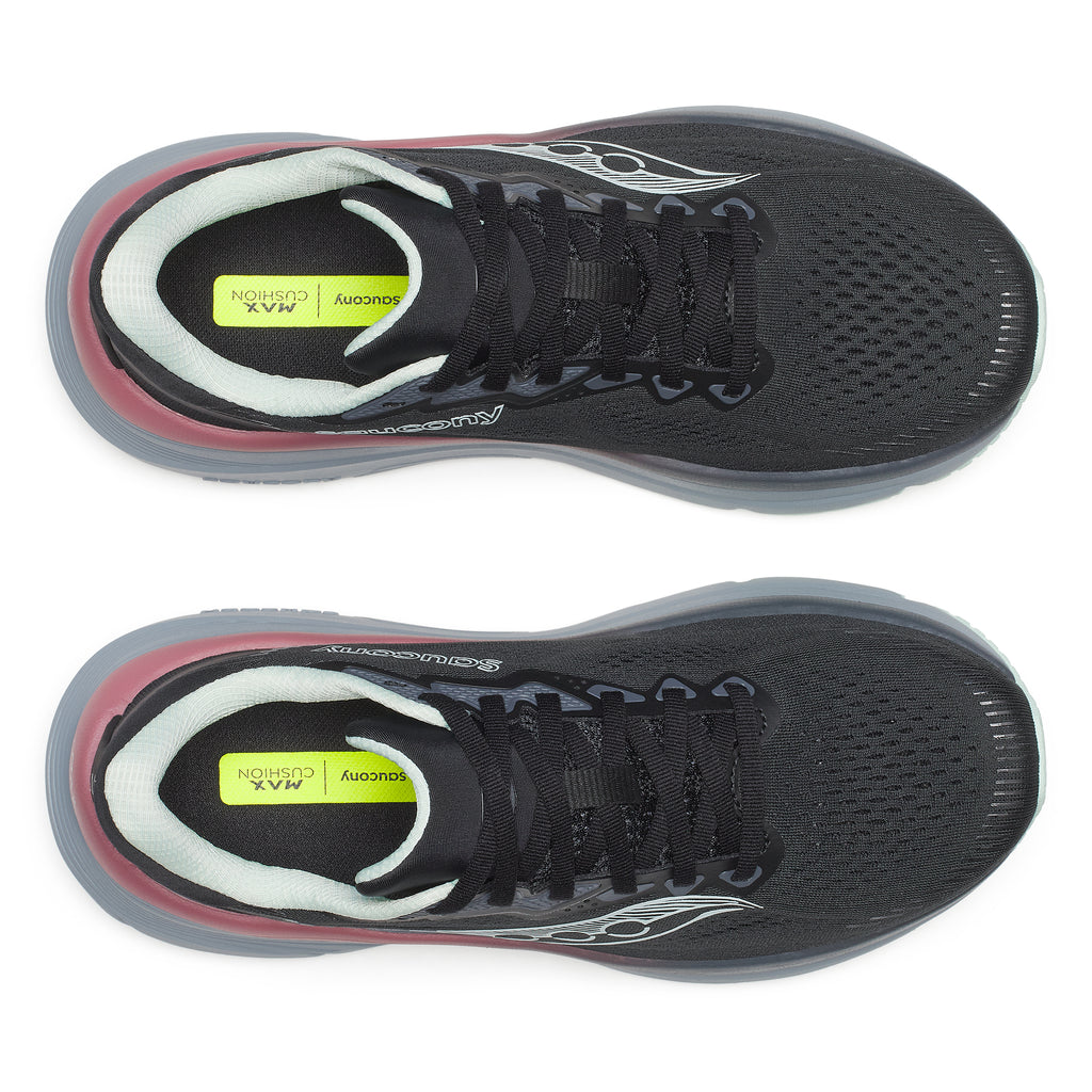 Black running shoes with red accents on a white background