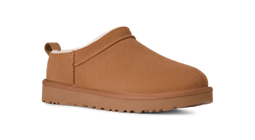 Brown slip-on shoe with white interior on a white background