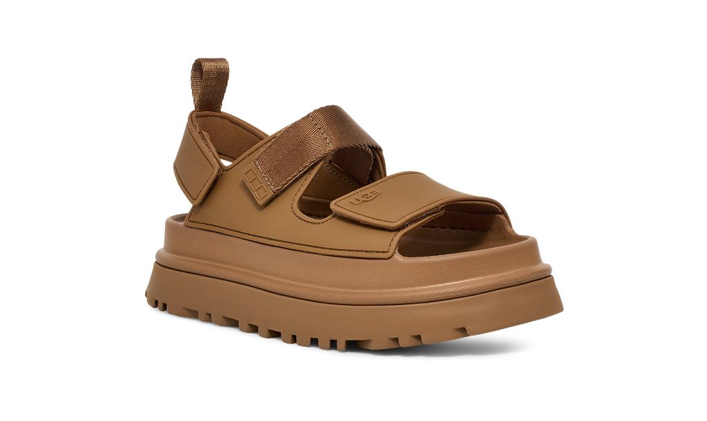 Brown  ugg sandal with thick sole on a white background
