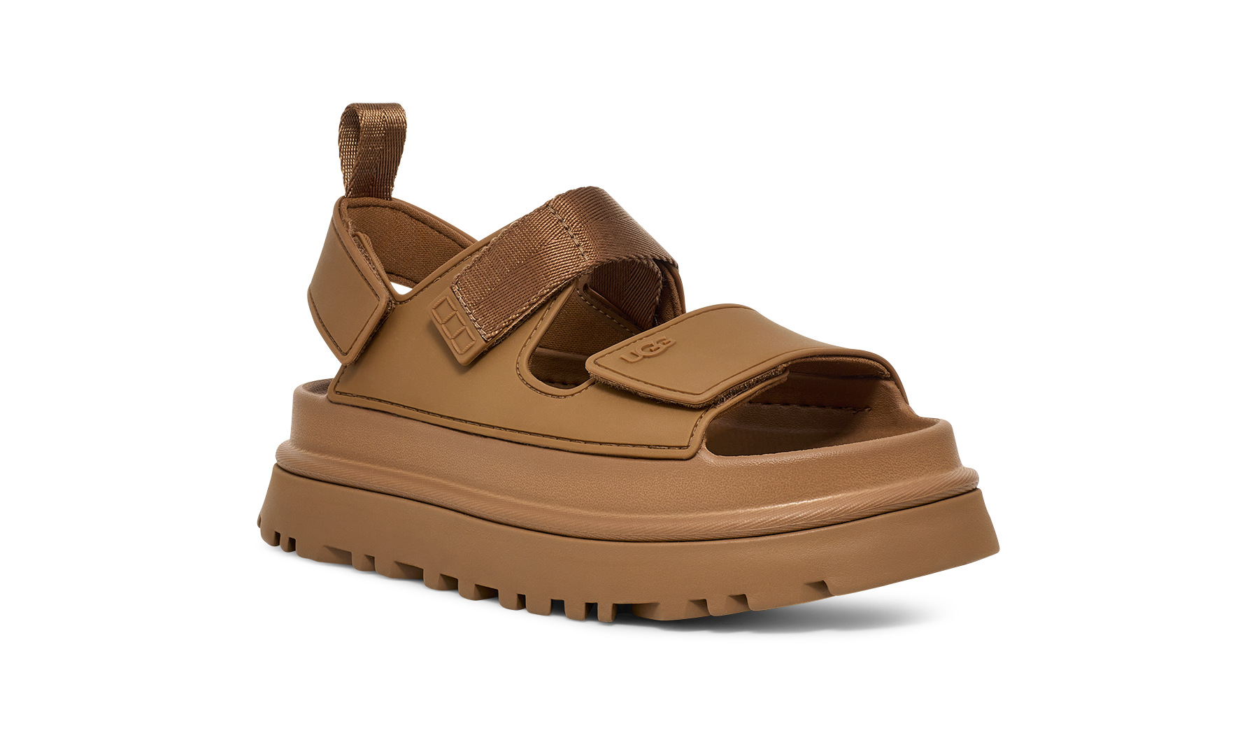 Brown  ugg sandal with thick sole on a white background