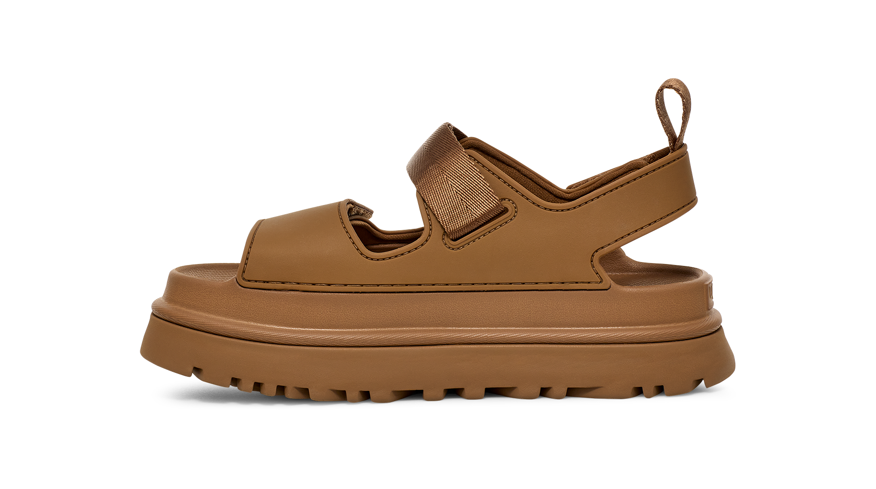 Brown Ugg sandal with thick sole on a white background