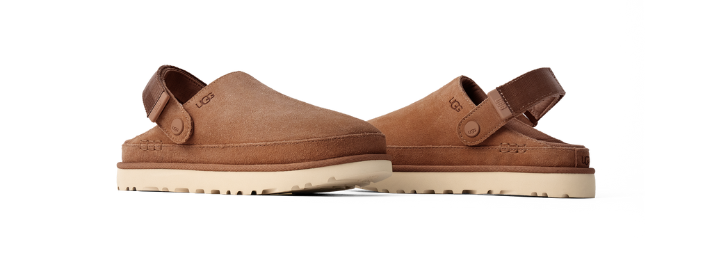 Pair of brown UGG CLOG sandals on a white background