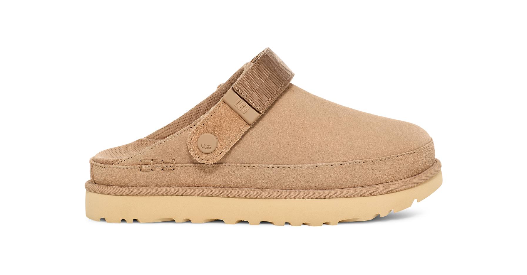 Tan clog shoe with a strap on a white background