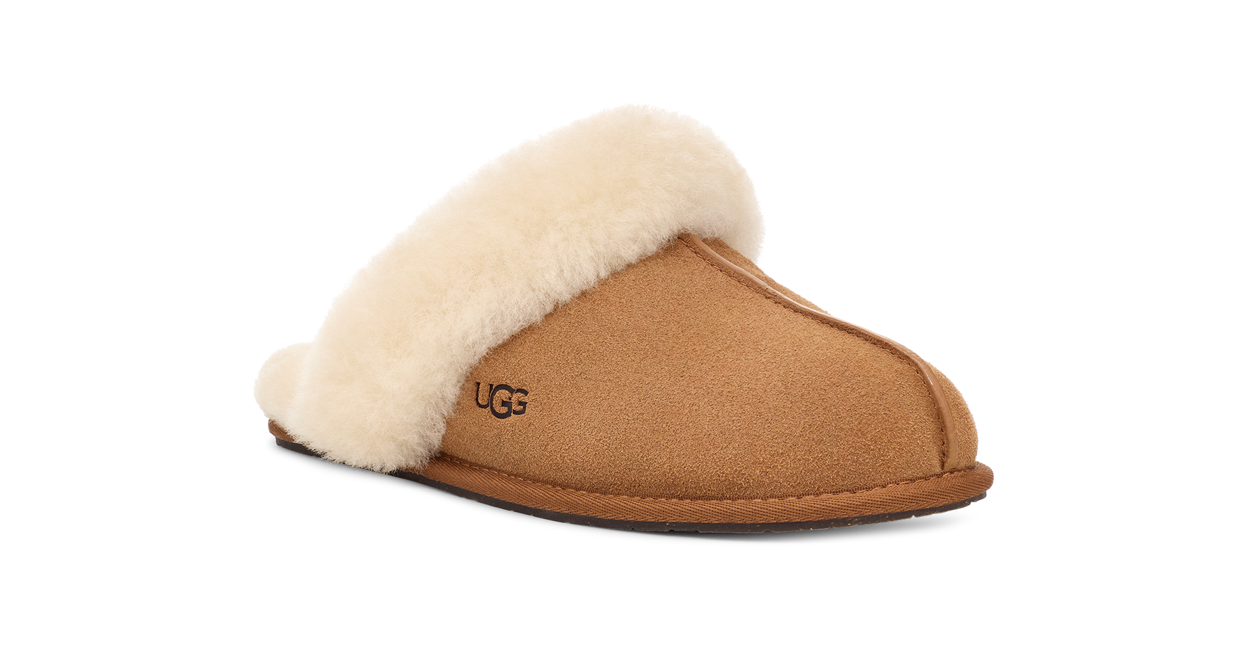 Brown UGG slipper with beige fur lining on a white background