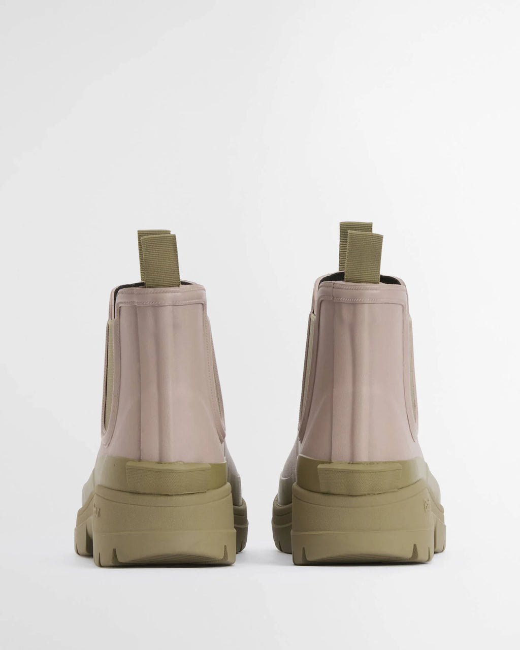 pink and beige barbour wellington boots on a white background