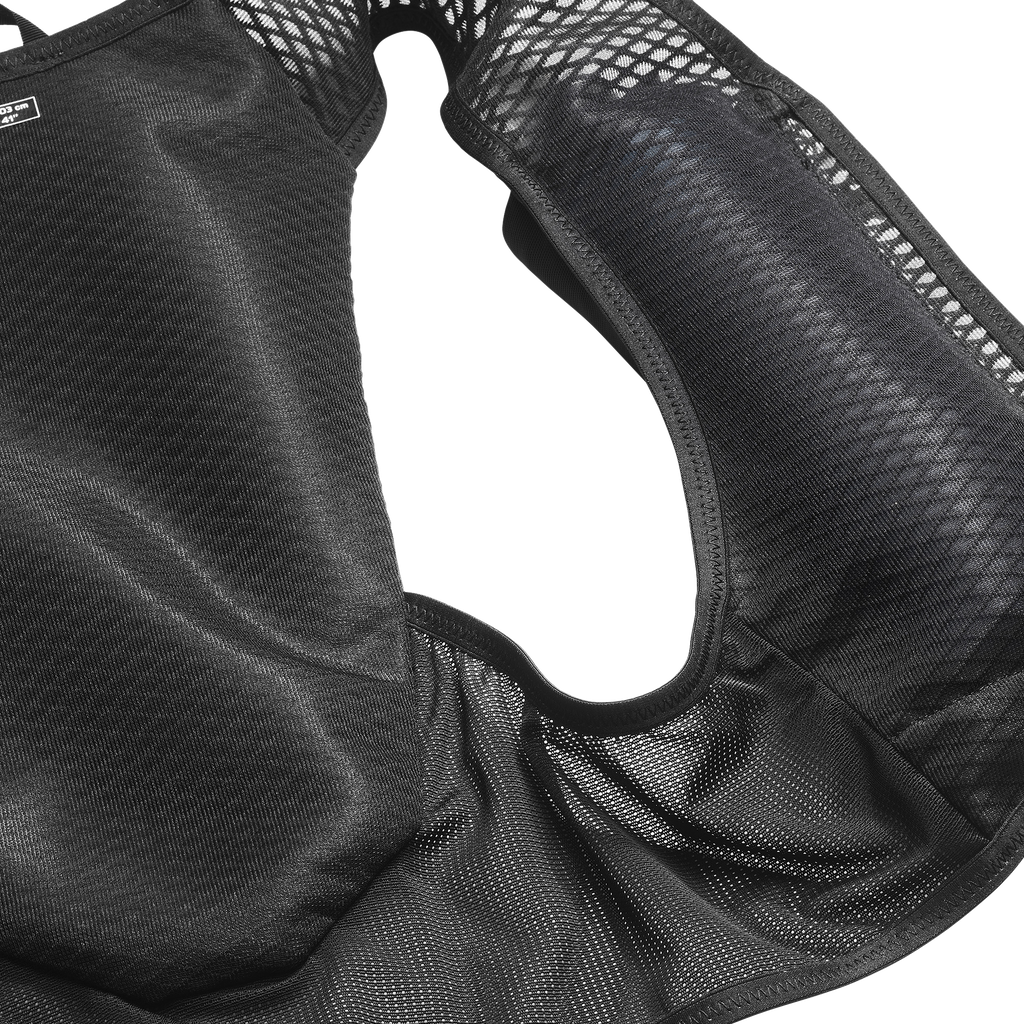 Black mesh hydration pack with a pocket on a white background