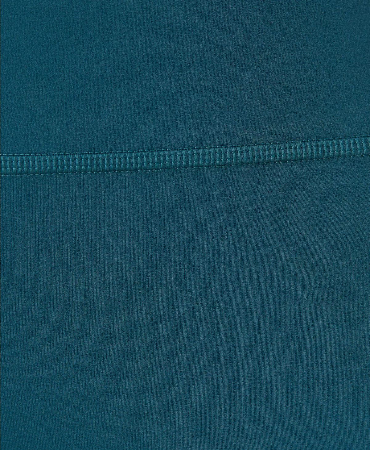 Close-up of a teal fabric texture with a zipper