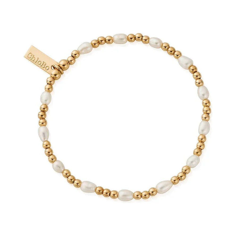 Gold and pearl beaded bracelet with ChloBo tag.
