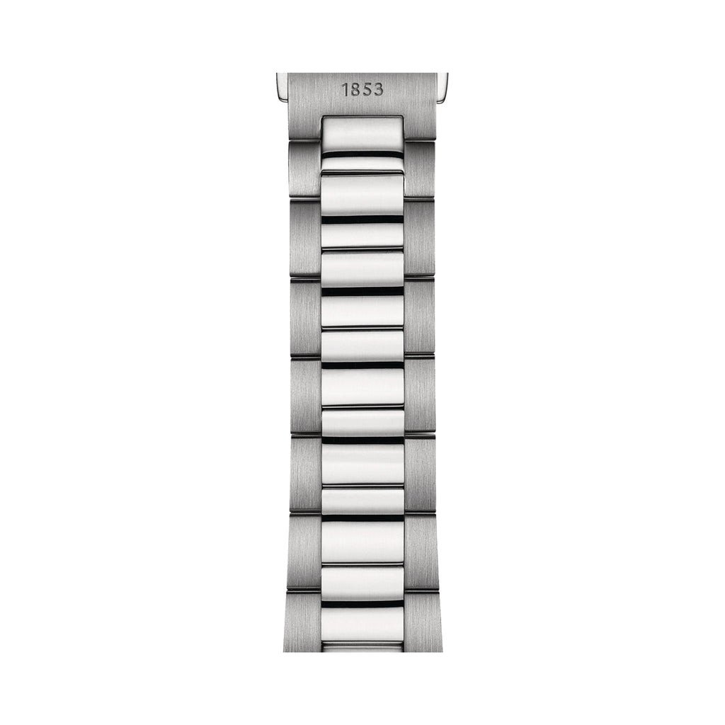 Close-up of the Tissot PR100 watch bracelet showing the stainless steel links and the "1853" engraving detail.