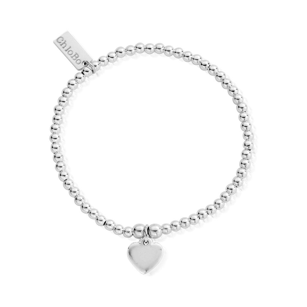 ChloBo heart bracelet, a delicate silver charm jewelry piece made of beaded strands and a heart pendant.