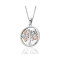 Clogau Tree of Life pendant in sterling silver and rose gold. Symbolic jewelry design.