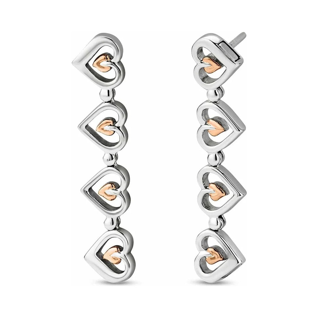 Silver and rose gold heart dangle earrings.
