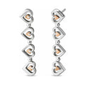 Silver and rose gold heart dangle earrings.
