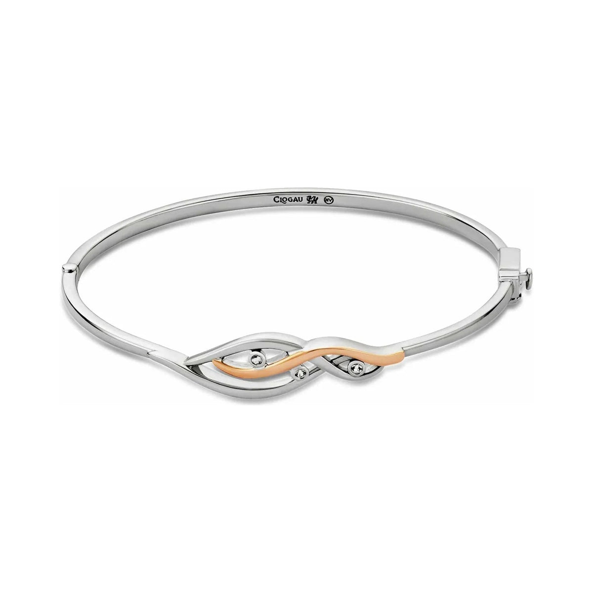 Silver bangle bracelet with rose gold detail and gemstones.
