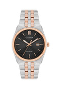 Close-up of the Citizen Eco-Drive watch showcasing its black dial, date display, and two-tone bracelet design.