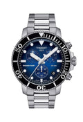 Close-up of the Tissot Seastar 1000 watch, a precise diver-style timepiece. Displays the blue dial, stainless steel band,