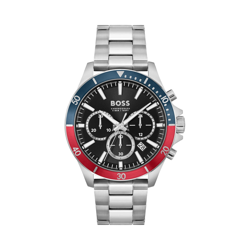 Close-up of BOSS Troper chronograph watch showcasing black dial, stainless steel band, & red/blue bezel.