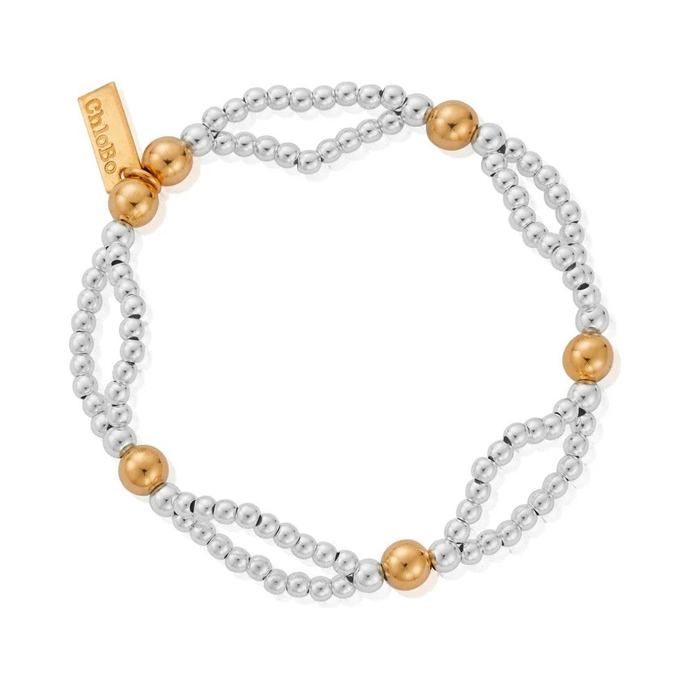 Beaded bracelet with gold accents.