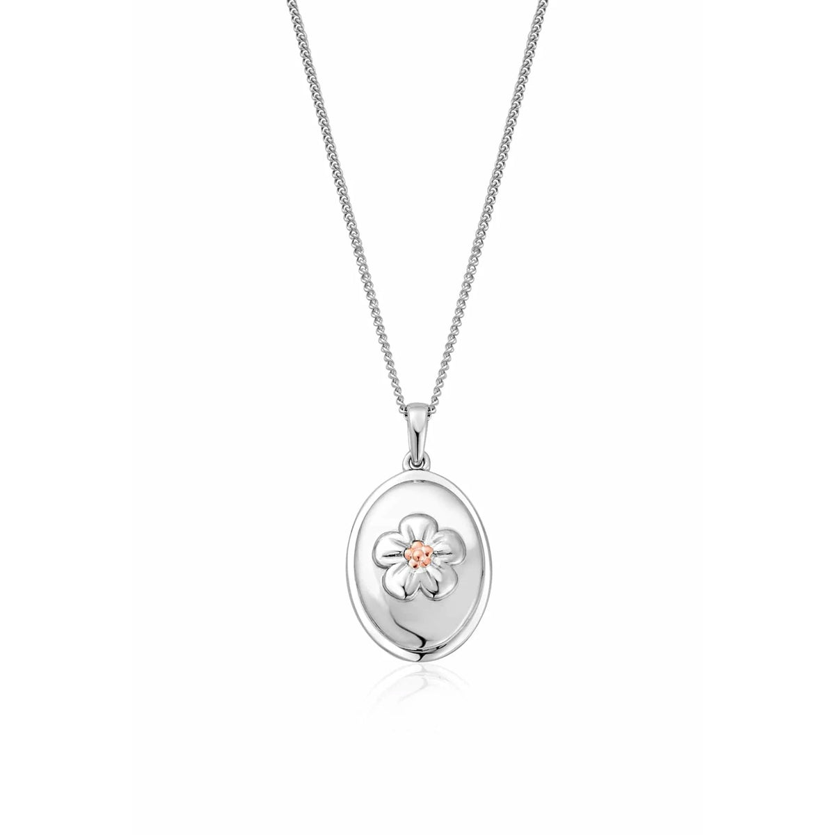 Close-up of the Clogau Natures Wonder silver pendant necklace, featuring a forget-me-not flower detail.
